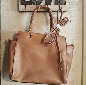 Used rose gold colored purse